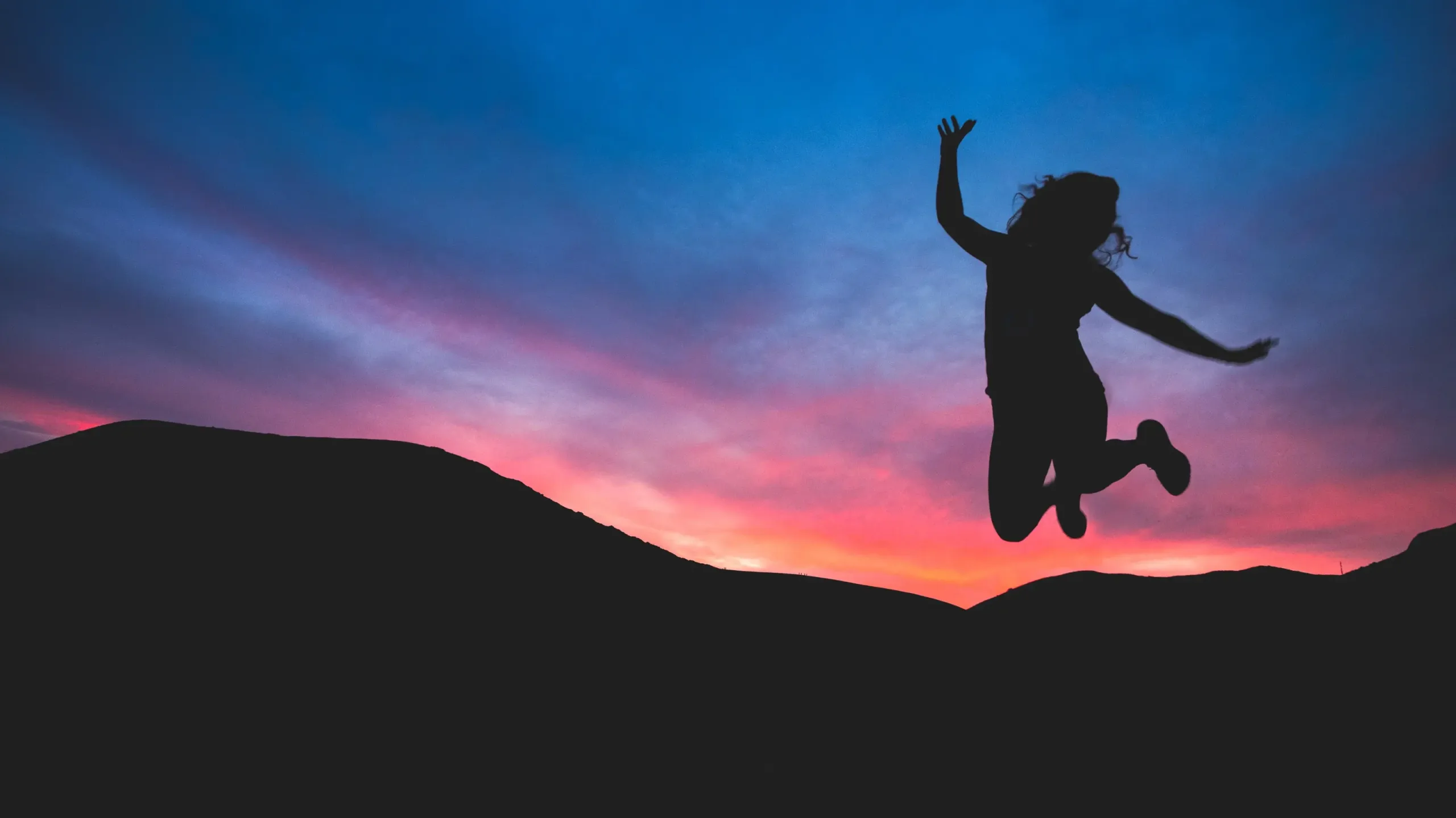 This picture shows someone jumping in the air happily. I hope you will feel this way after therapy with Juline Counselling!